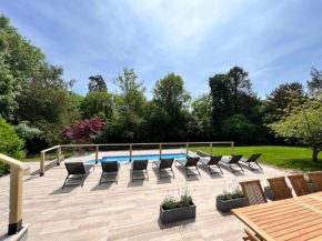Refurbished coach house with pool & wood fired hot tub